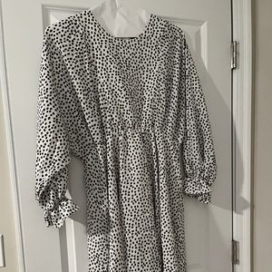 Perfect for spring dress. Sheer sleeves, white and black polka dots,